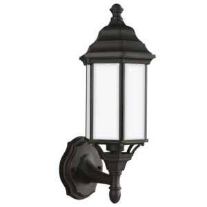 Sevier  Outdoor Wall Lantern in Antique Bronze by Generation Lighting.