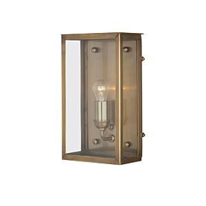 Royster  Outdoor Wall Sconce in Antique Brass   Clear by Currey and Company